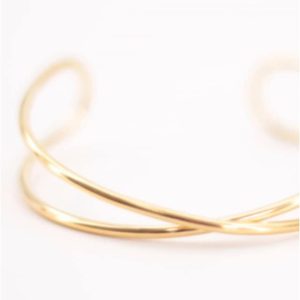 Brazalete mujer acero dorado cruzado