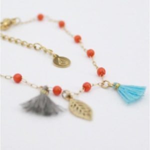 Pulsera mujr acero dorado pompones